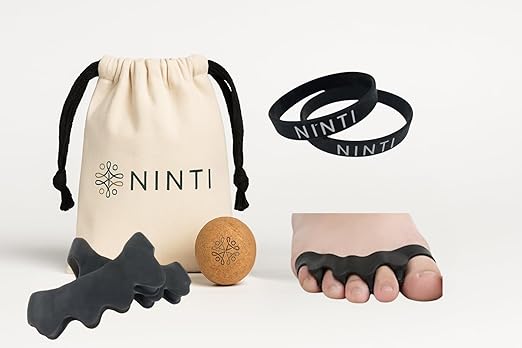 Toe separators kit with resistance band and massage ball - Includes latex free spacers, bunion corrector, cork massage ball, and cotton bag. Enhance toe alignment, ease plantar discomfort, and foot pain.