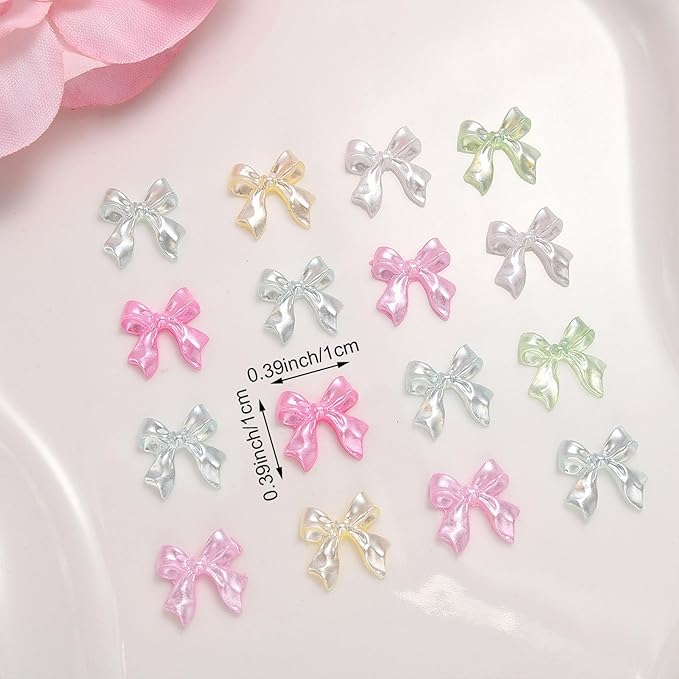 100PCS Bow Nail Charms, 3D Cute Colorful Bow Colorful Aurora Flat Back Manicure Decorations for Nail Jewelry DIY Crafts