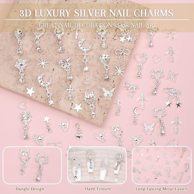 100Pcs Dangle Silver Nail Charms and Gems, Cross Star Heart Crown Planet Bows Butterfly Nail Gems Charms Silver Nails Art Supplies for Women DIY Accessories